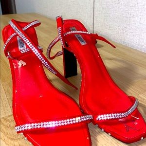 Red heels with lace up jeweled straps